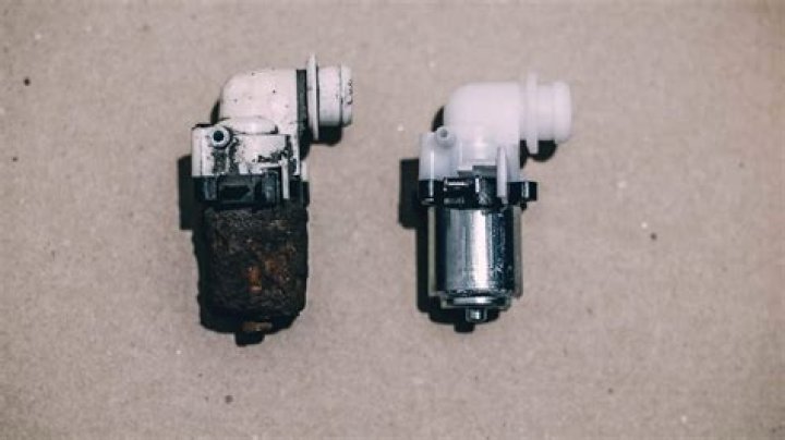 How do you change a windshield washer pump on a Honda Civic