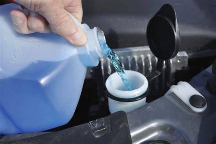 How do you use windshield wiper water